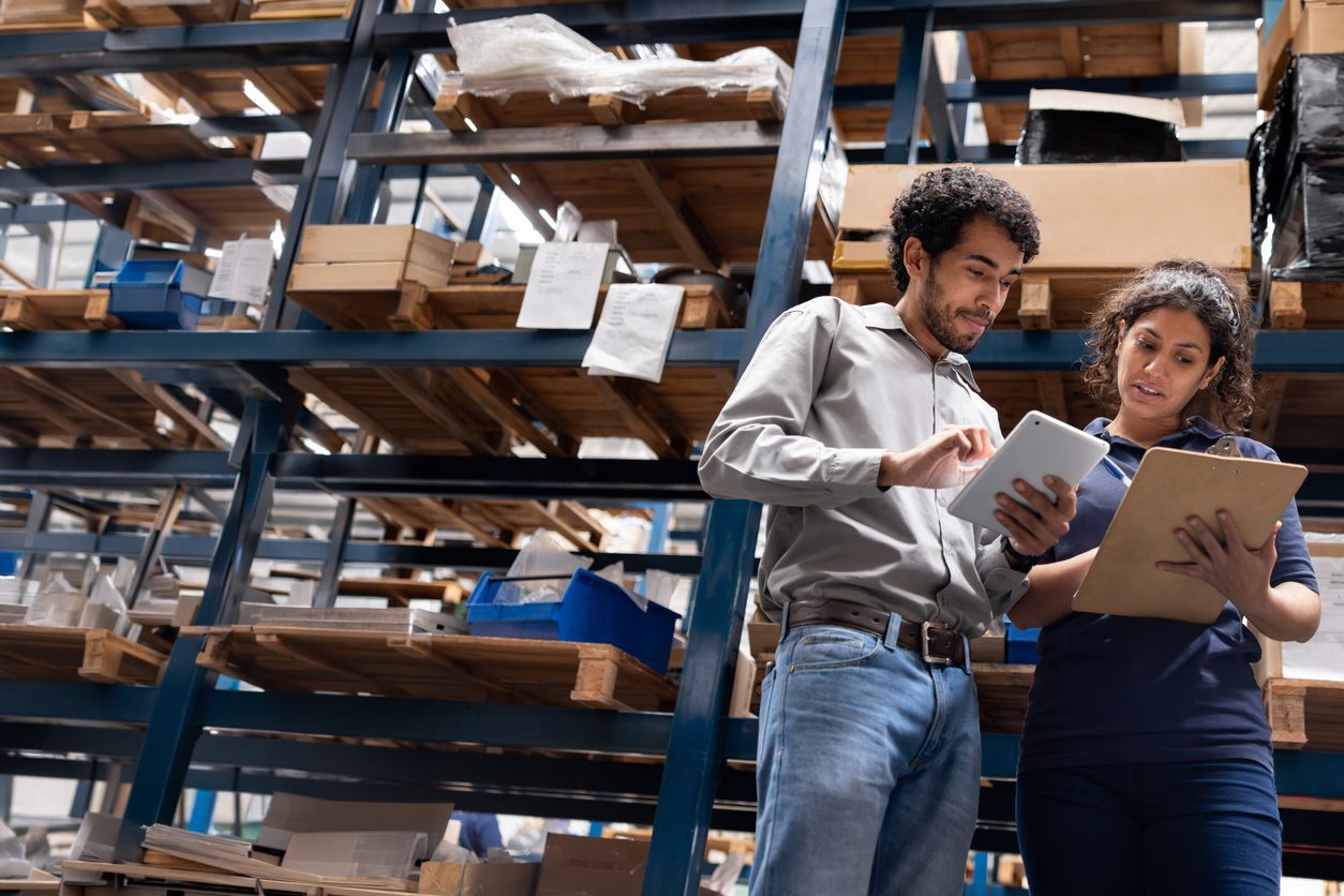 Warehouse team reviewing inventory and fulfilment operations