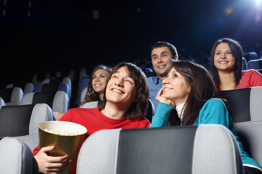 Image of people enjoying a movie in a cinema.