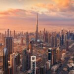 Dubai skyline and modern business district representing tax in Dubai for individuals and companies.