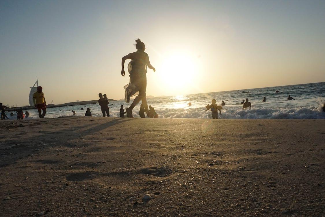Free People At The Dubai Beach Stock Photo