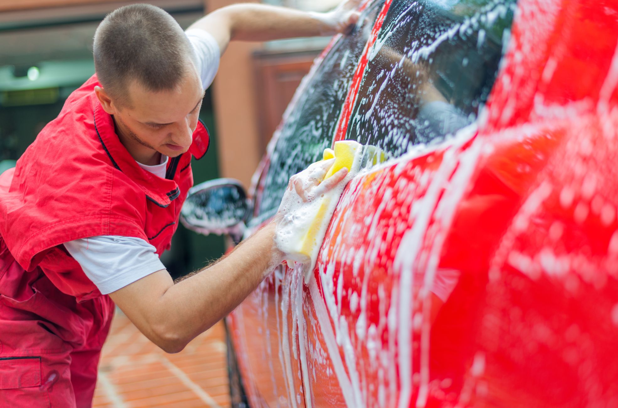 Stock image man working at car wash