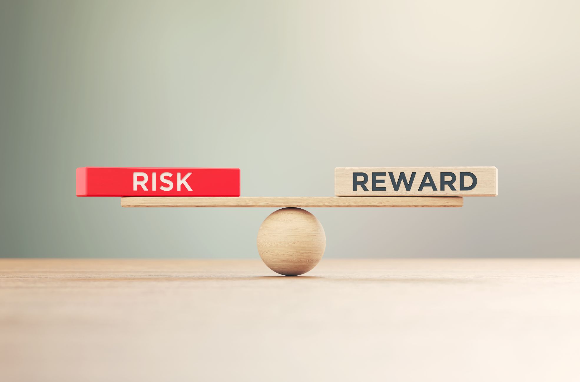 Stock Photo illustrating Risk Vs Reward On Scales With Words For Financing