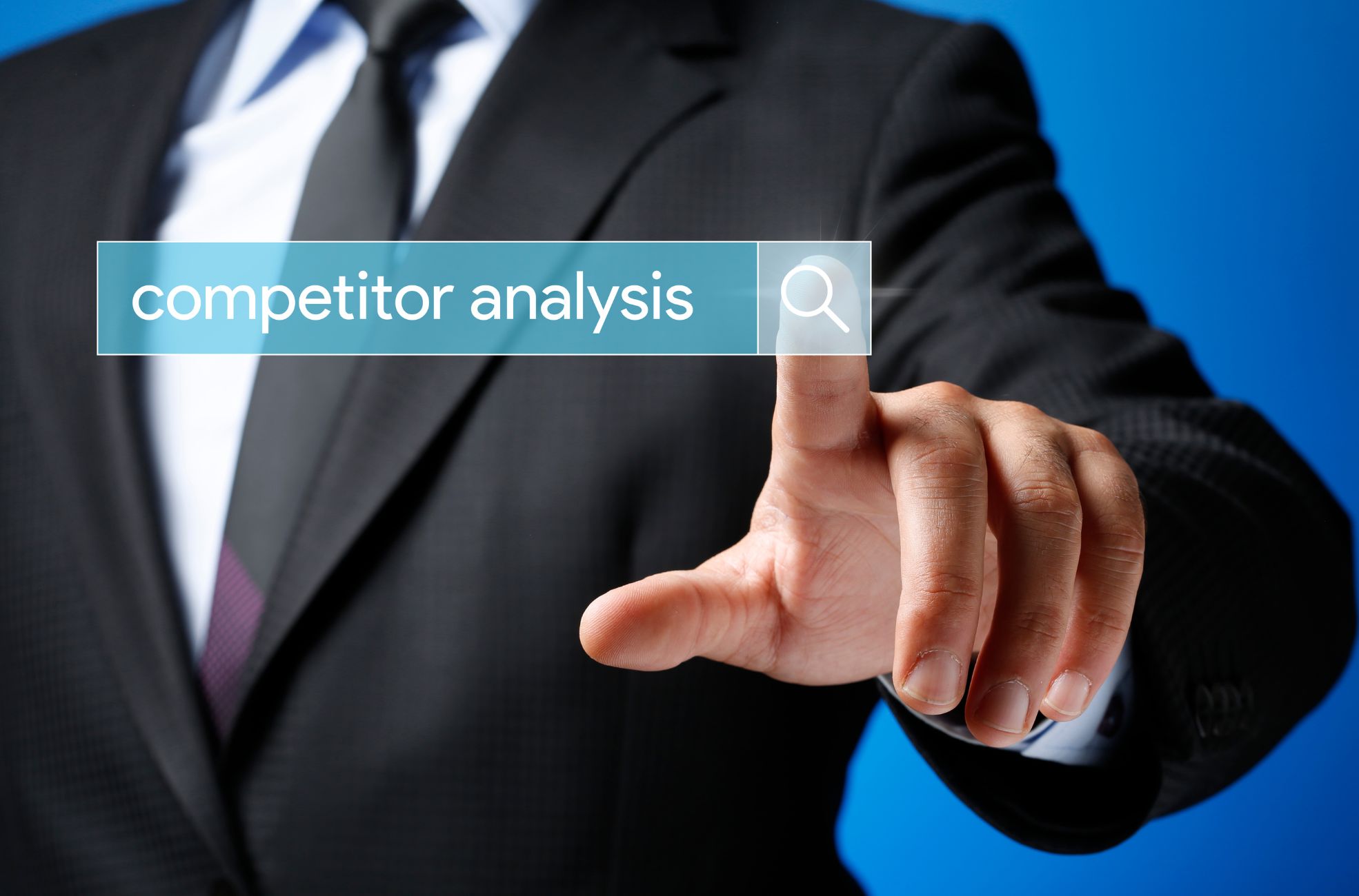 Stock Photo of Man And Words: Competitor Analysis