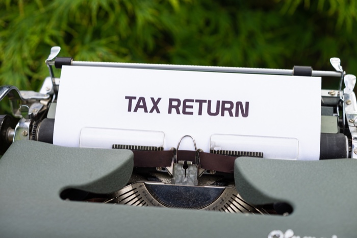 Stock Photo Typewriter Printing The Words " Tax Return" 
