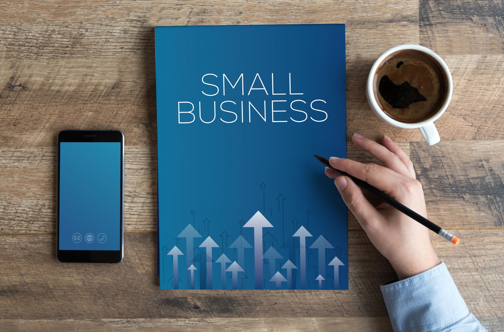 Stock Photo Of Small Business Booklet With Phone And Coffee