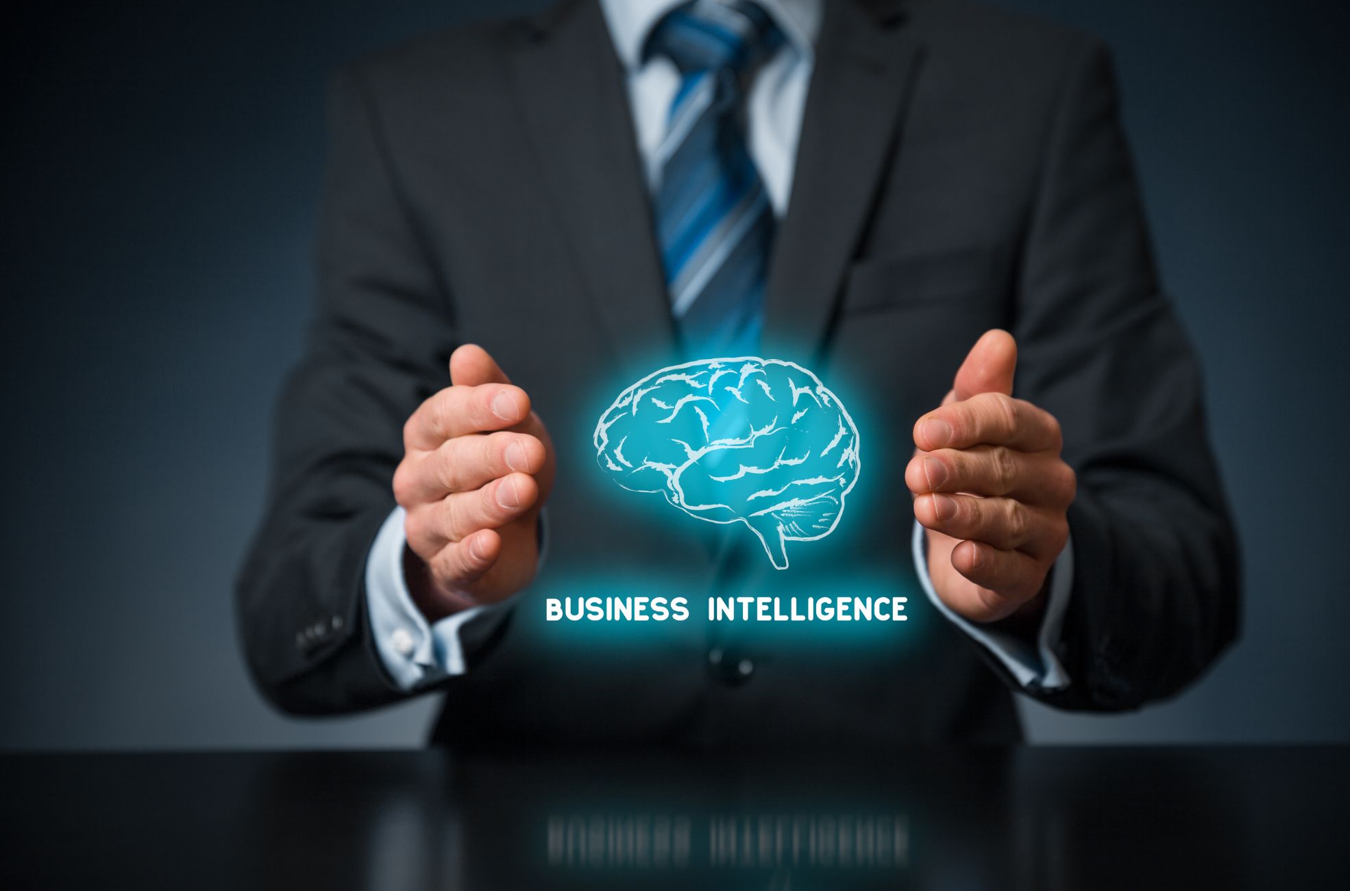 Man in Suit With Brain And Words Saying Business Intelligence