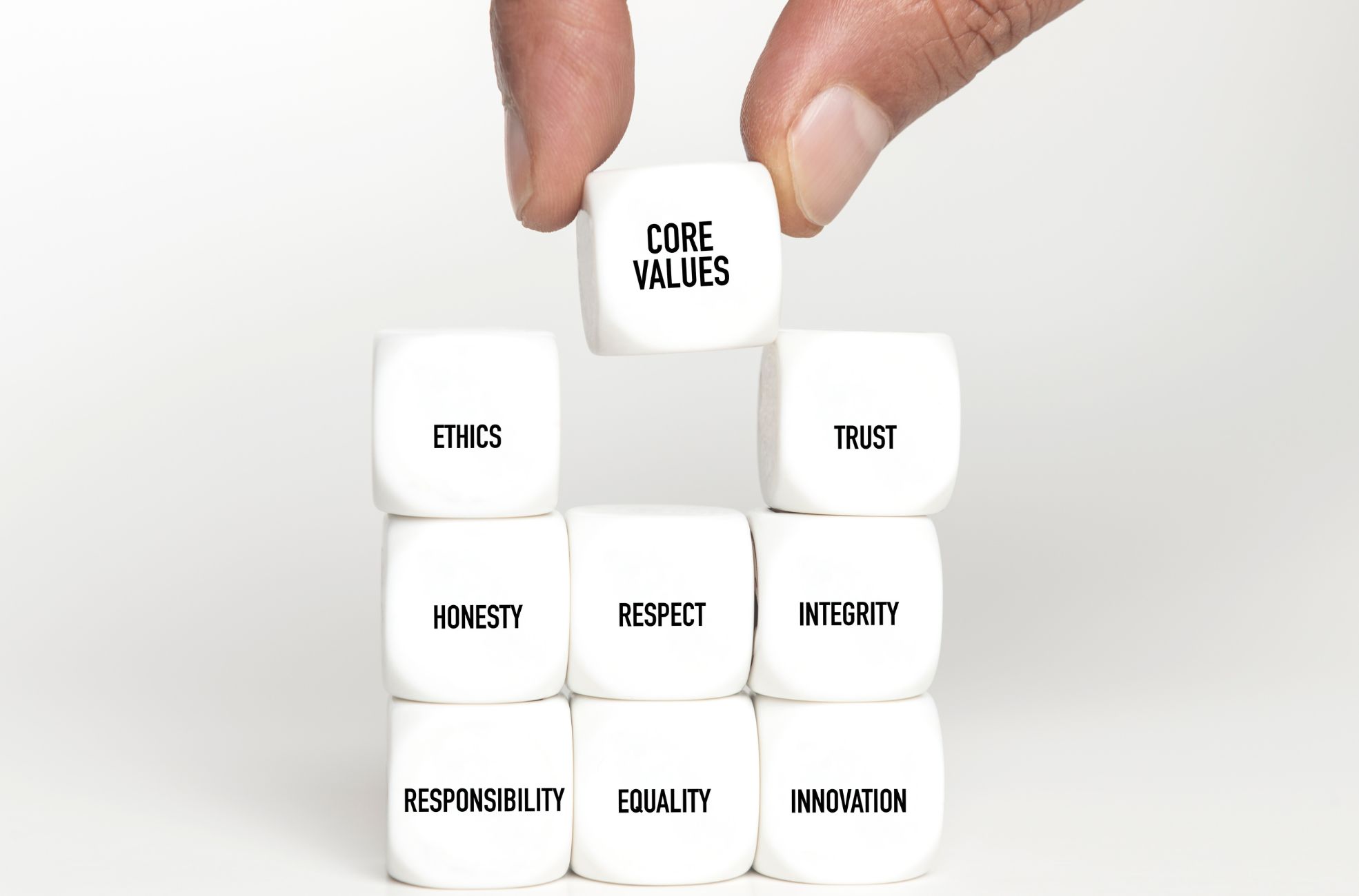 Stock Photo Core Values Shown By Cubes With Hand