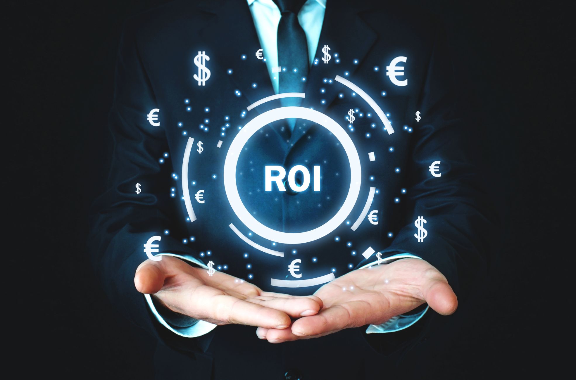 Business Man Showing ROI Written In A Digital Font Holding It In His Hands