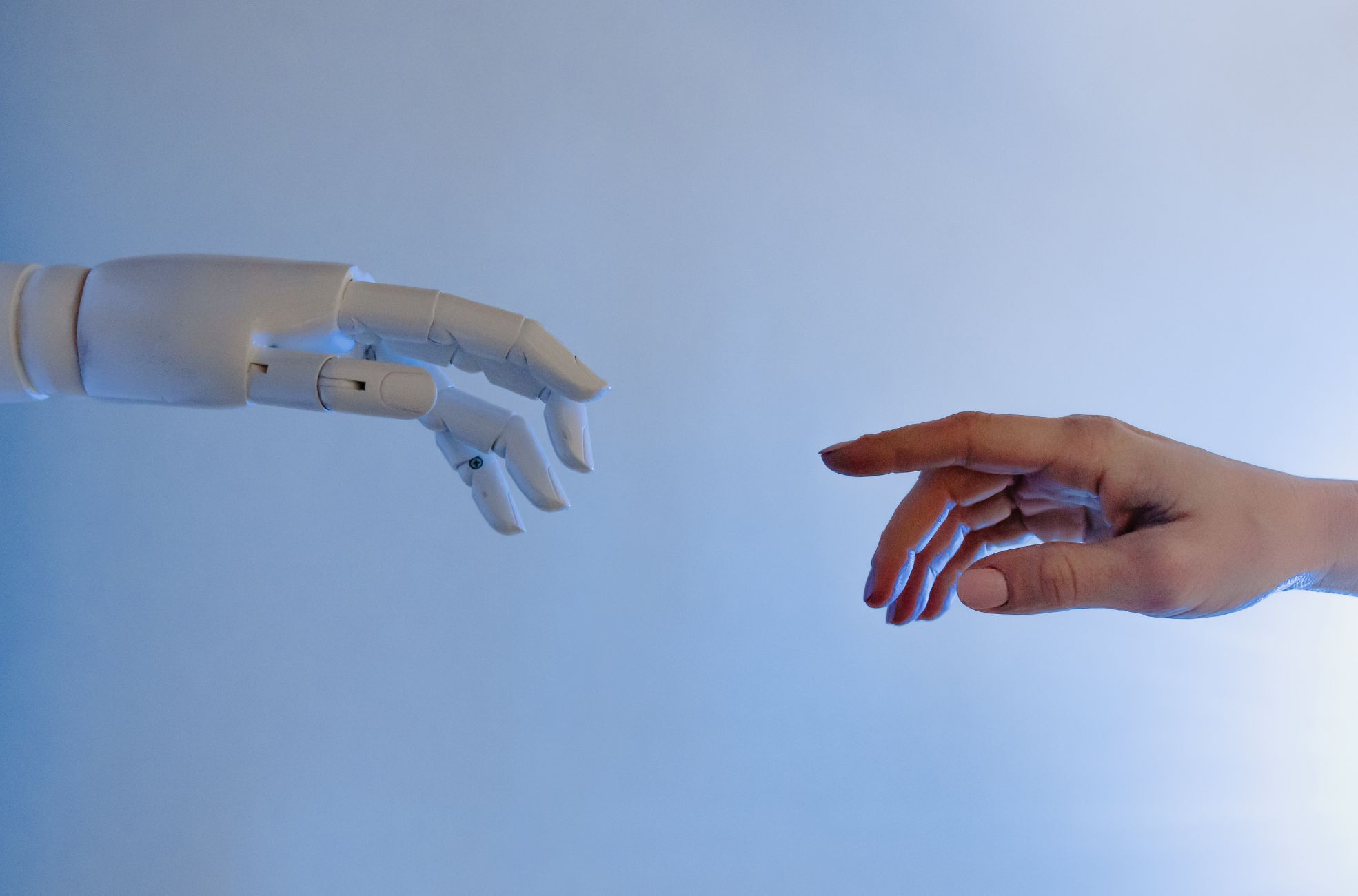 AI Hand Next To Human Hand