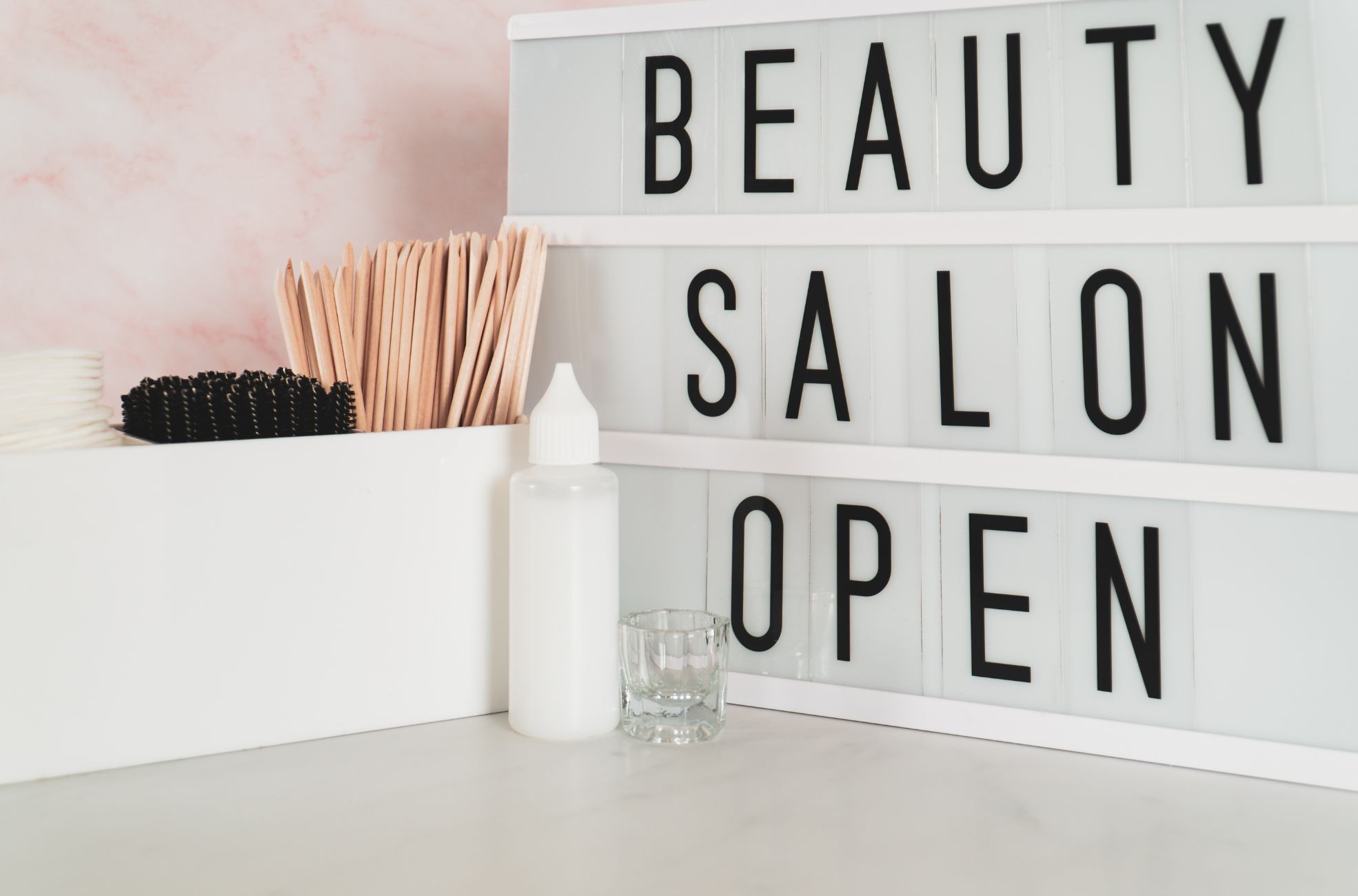 Sign On Cosmetic Counter Saying Beauty Salon Open