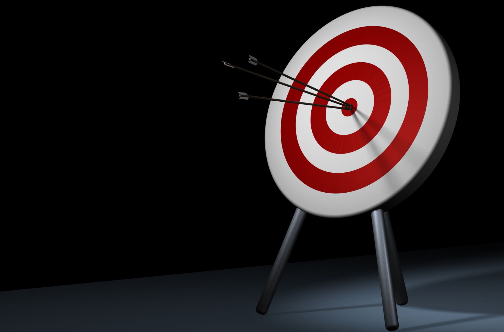 Dartboard With Arrows Showing Target Bullseye