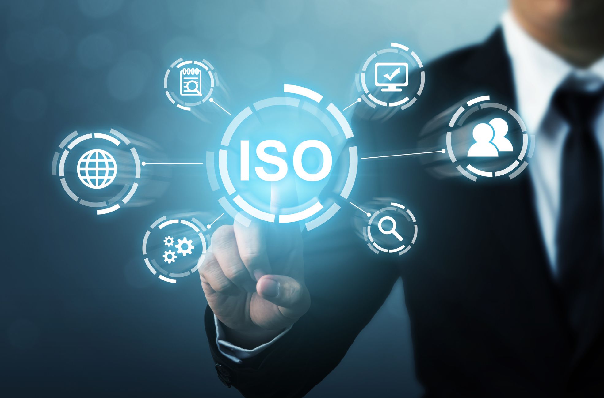 Businessman Pointing To ISO On Screen