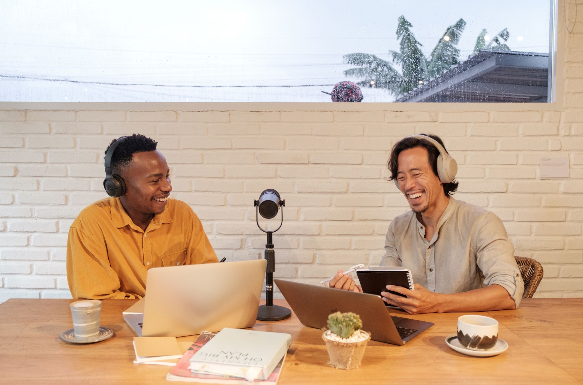 Two Men Working On A Podcast