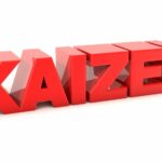 Red Block Letters Spelling "Kaizen"