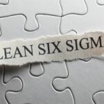 Puzzle Pieces With Title Of "Lean Six Sigma"