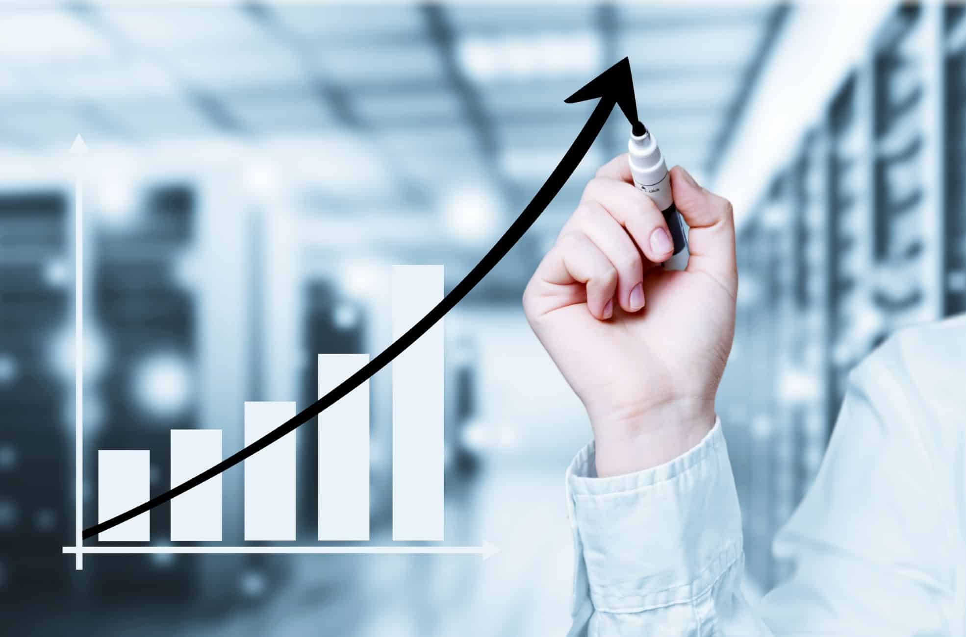 Business Man Using Graph To Show A Business Accelerator