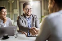 People Shaking Hands For Job Interview