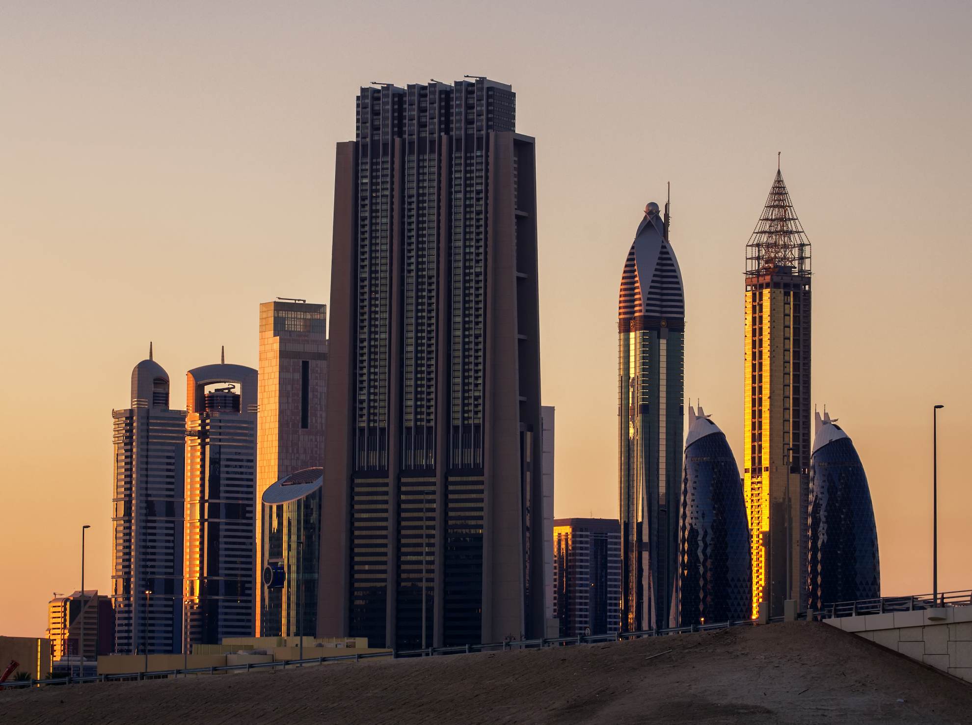 An image of downtown Dubai at sunset.